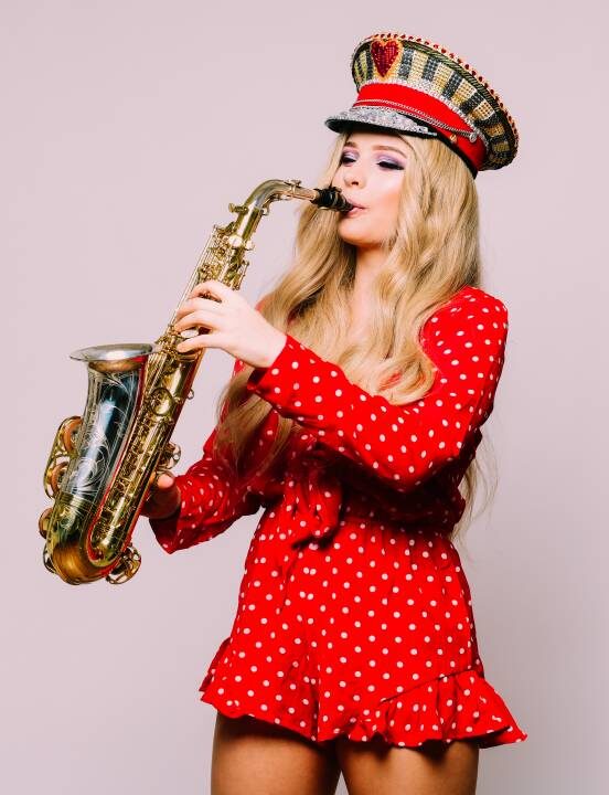 the sax girl playing saxophone
