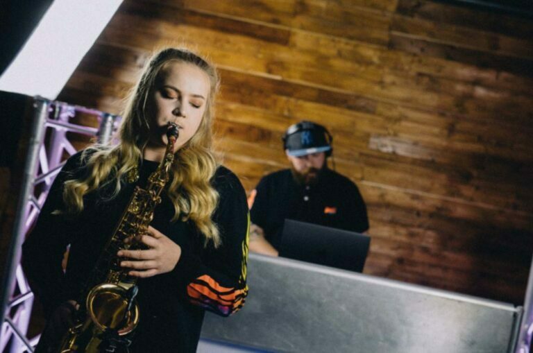 miss sax playing saxophone