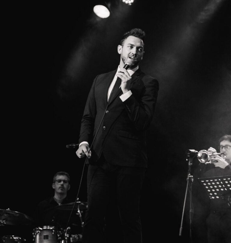 picture of the buble tribute show on stage black and white.