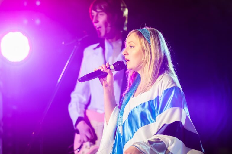 Picture of Abba tribute band on stage singing