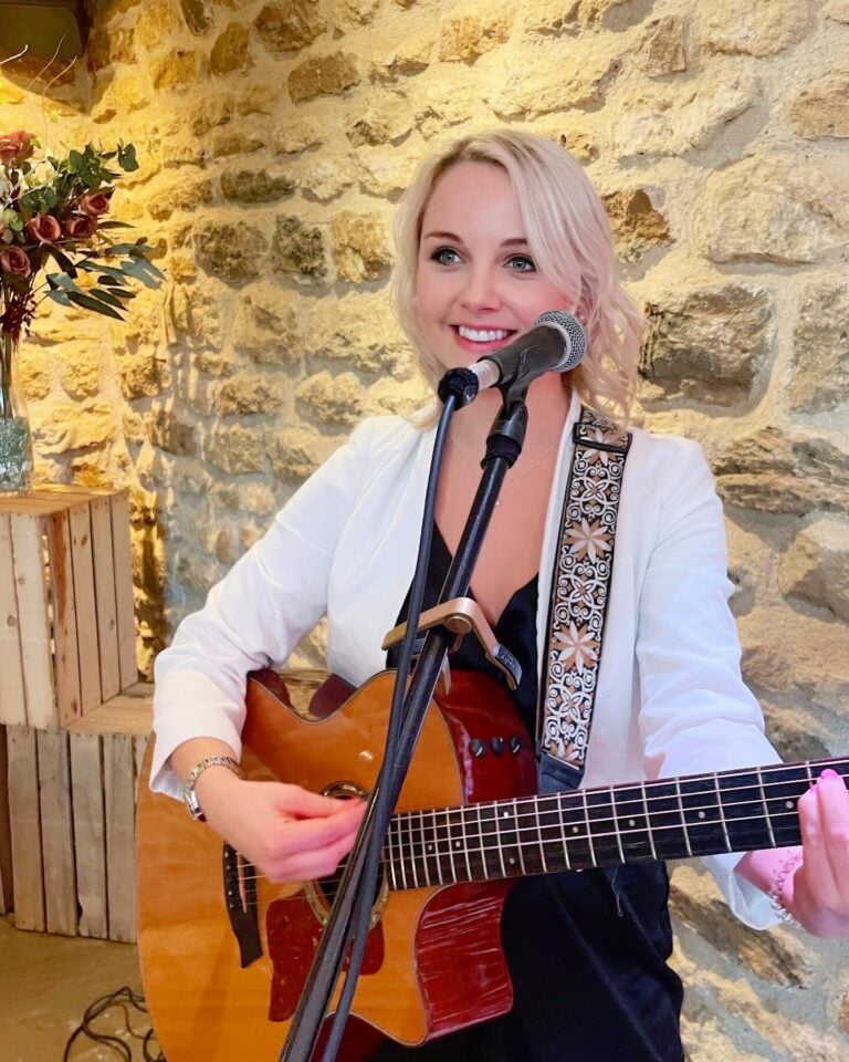 Daisy Acoustic Singer performing at a wedding