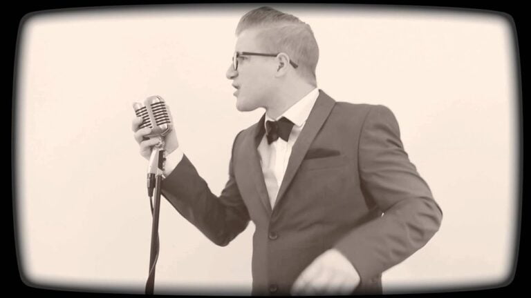 Chris The 50's Singer singing into vintage microphone