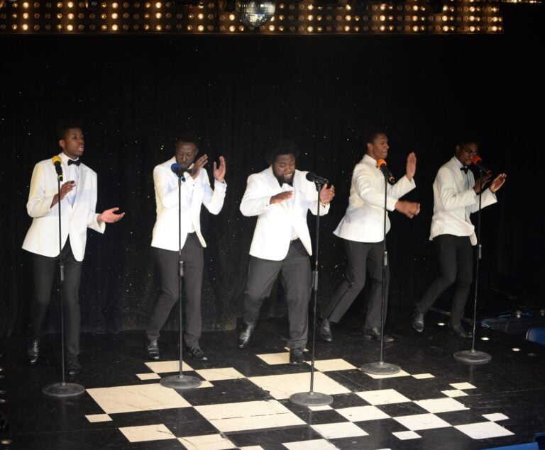 The Sensations Band in white jackets