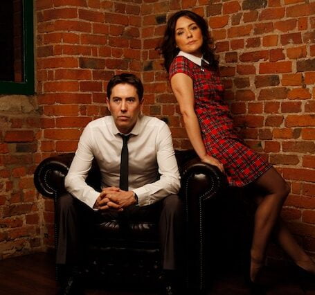 picture of the nights duo sat on chair