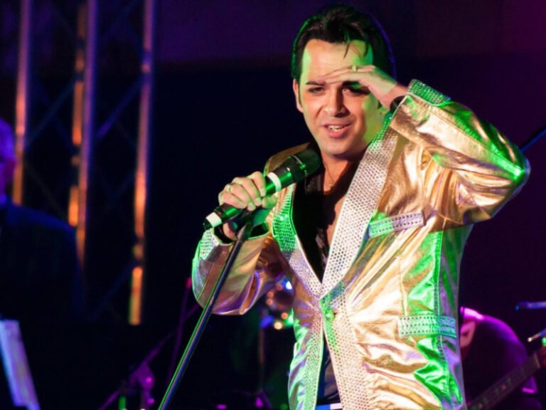 elvis presley tribute act on stage in liverpool