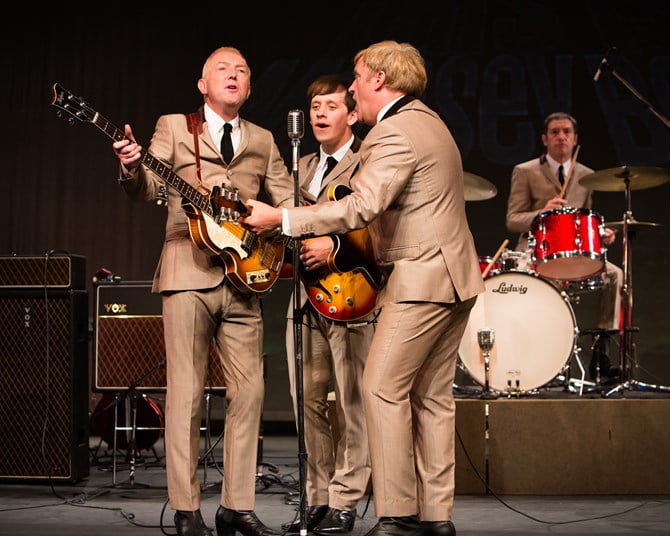 The 60's Band performing live on stage