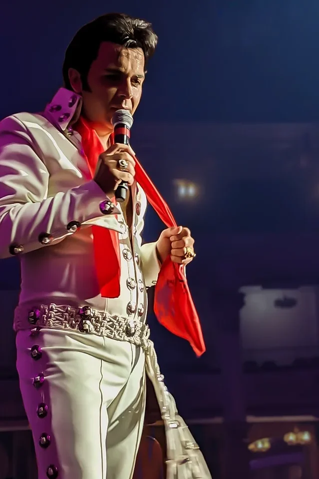 elvis presley tribute act in white jumpsuit