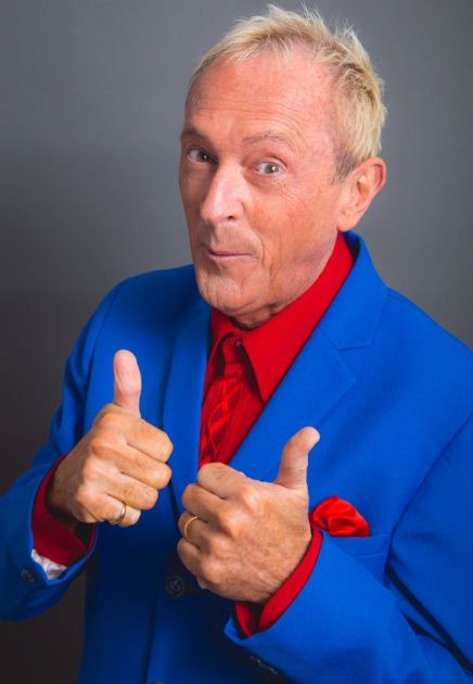 Carl Comedian In Blue Suit