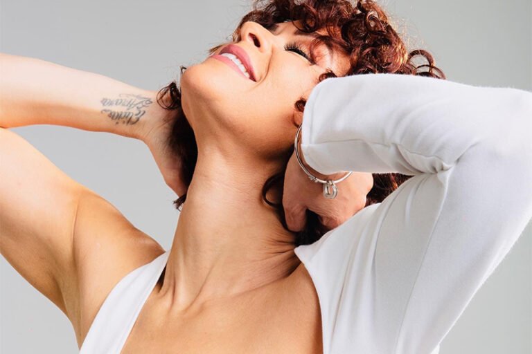 Whitney Live The Tribute in white dress