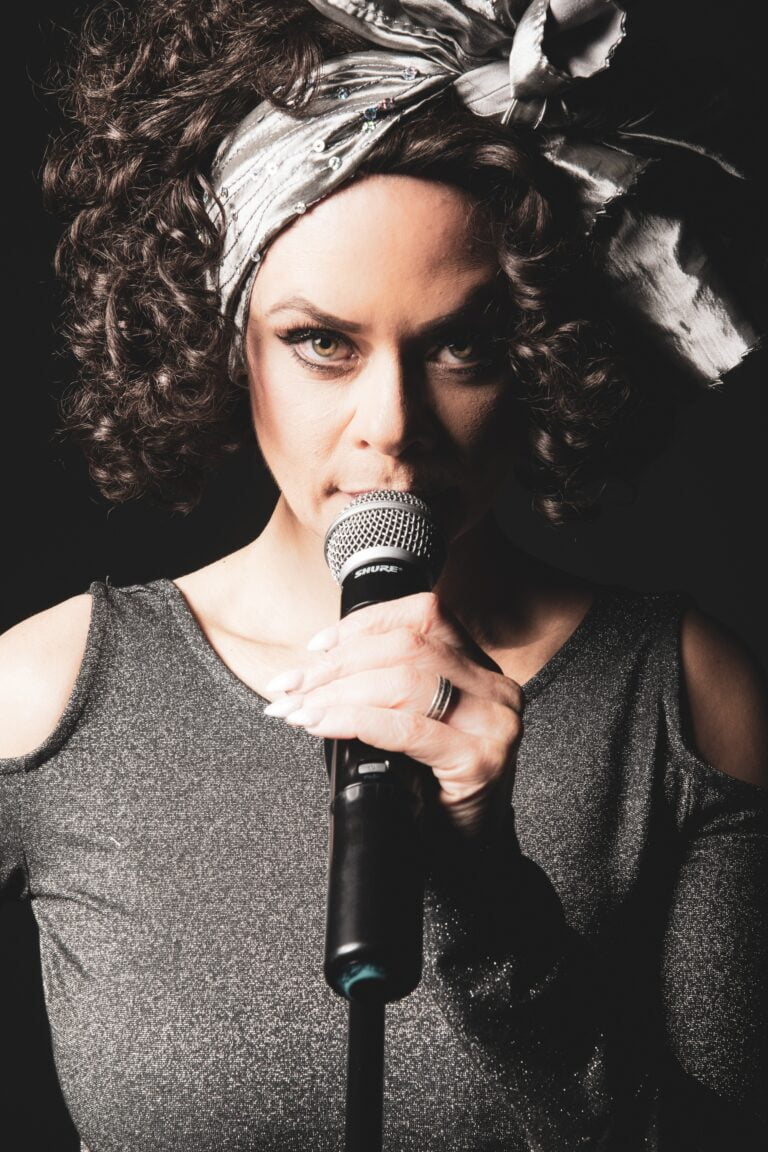 Whitney Live The Tribute with hair piece in